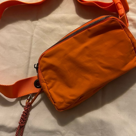 Fanny Packs Adjustable Strap, Bum Bag for Running Hiking Travel Workout (Orange) - Picture 5 of 8